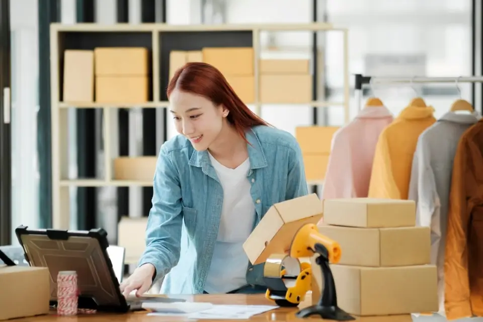 Woman Managing Ecommerce Store Inventory